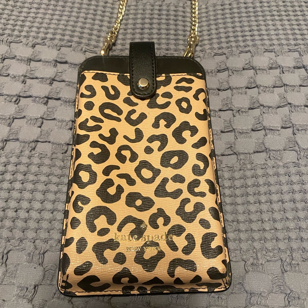 Kate Spade remi graphic leopard colorblock north south tab phone crossbody bag.